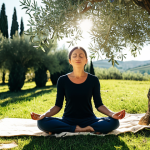**

A woman meditating in a peaceful garden in Tuscany, Italy, fully clothed in comfortable clothing. Sunlight filters through the olive trees. Safe for work, appropriate content, family-friendly, perfect anatomy, natural pose, professional.

**